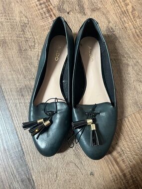 ALDO Black Tassel Slip-On Loafers with Gold Accents